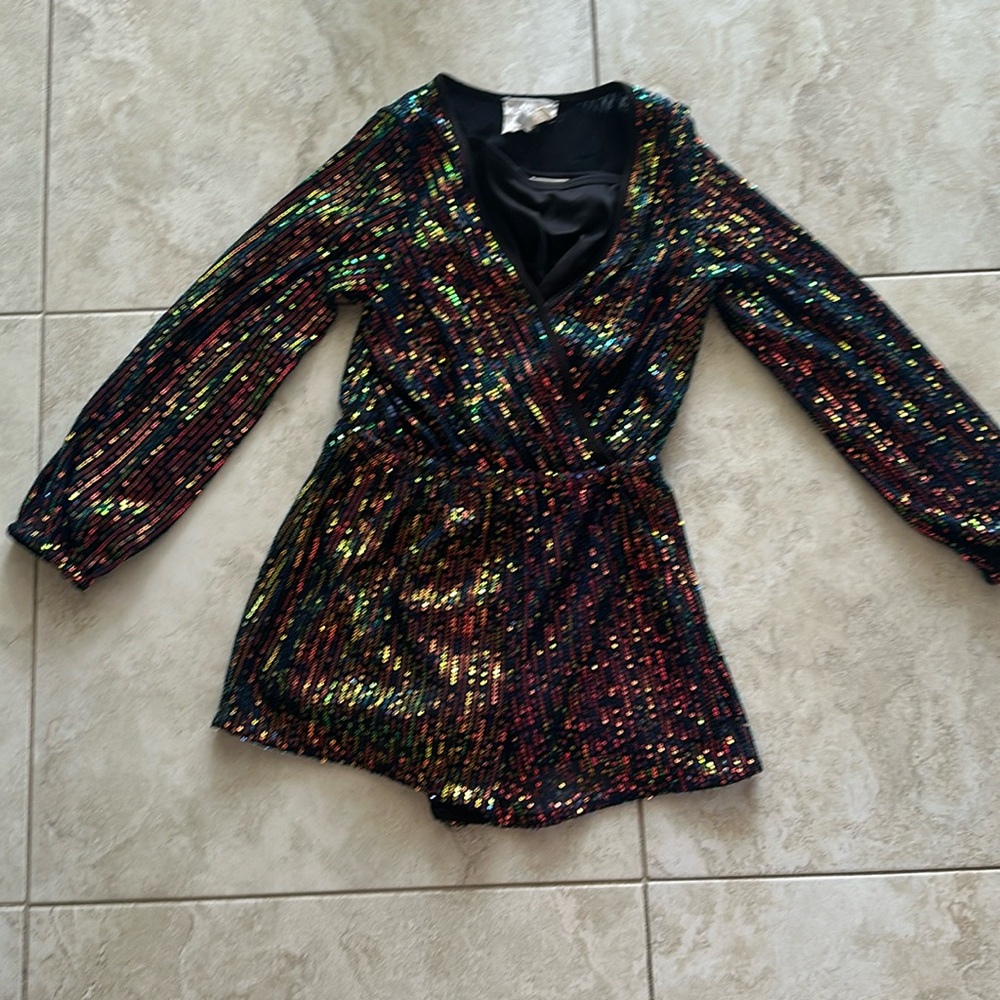 The brand is Hannah Banana, size 7, and it is multi color.